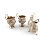 A collection of four George II and George III silver cream jugs, various makers, London 1741,