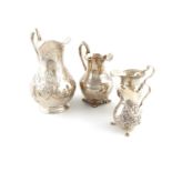 A small collection of four Victorian and Edwardian silver cream jugs,comprising: one London 1842,