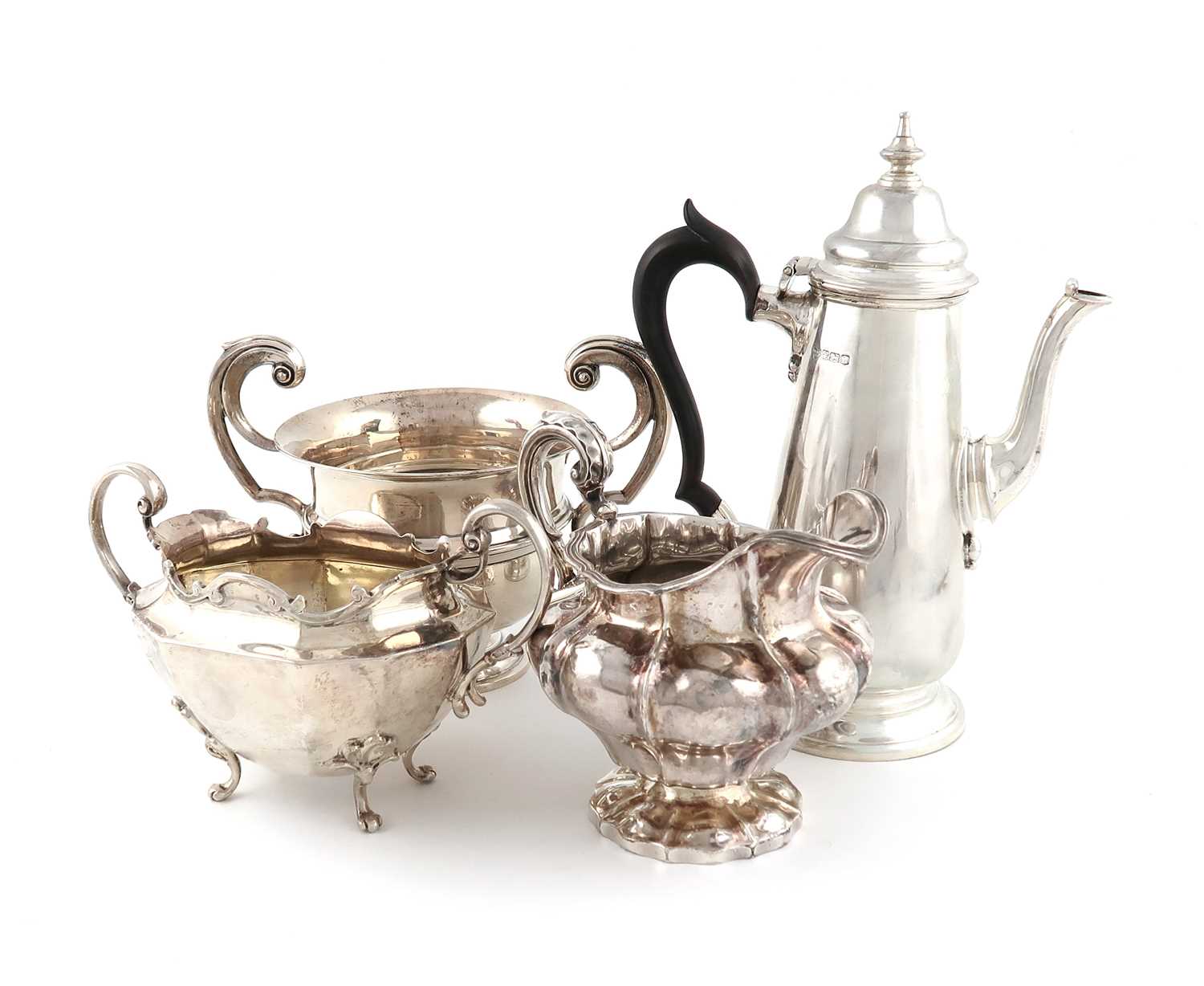 A mixed lot of silver items,comprising: a coffee pot, by Goldsmiths & Silversmiths Co Ltd, Sheffield