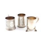 A collection of three Victorian and Edwardian silver mugs,one by Martin, Hall and Co. London 1889,