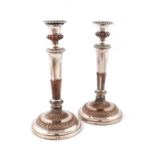 A pair of George III old Sheffield plated candlesticks,by Matthew Boulton, circa 1810,tapering