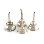 A collection of four antique silver wine funnels,various dates and makers, including London 1802,
