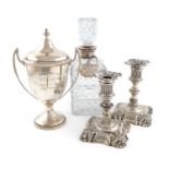 A mixed lot of silver items,various dates and makers,comprising: a two-handled trophy cup and cover,