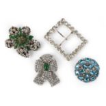 Christian Dior, two paste brooches, comprising: a brooch designed as a ribbon rosette, set with