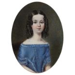 λ English School c.1840 Portrait miniature of a young girl wearing a blue dress Oval, in a