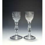 A pair of small wine glasses of possible Jacobite significance, c.1770, the ogee bowls engraved