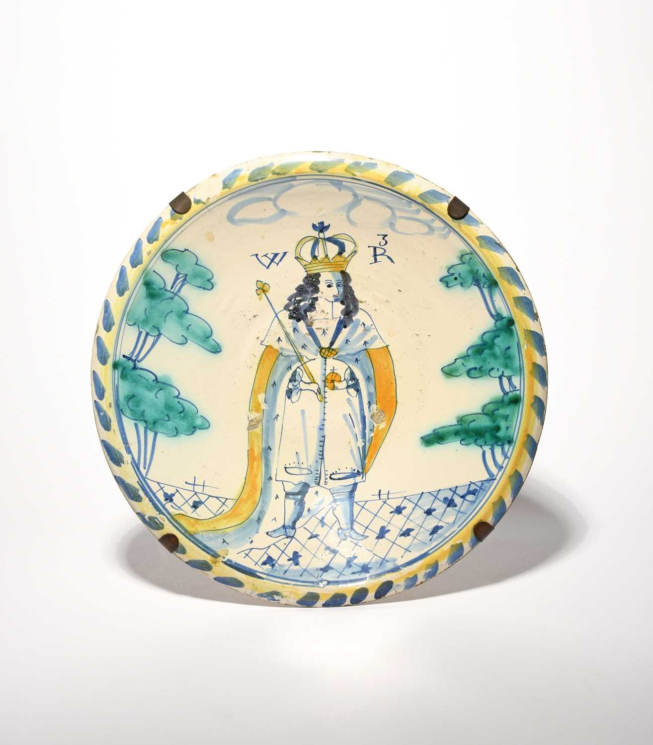 A London delftware Royal blue dash charger, c.1690-95, painted with a full length standing - Image 2 of 2