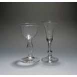 A mead glass and a balustroid wine glass, c.1740-50, the former with a shallow bowl raised on a