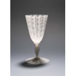 A Venetian or façon de Venise latticino glass or goblet, probably late 17th century, the deep