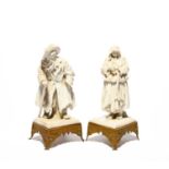 A pair of Italian porcelain figures of peasants, late 19th/20th century, well modelled as a