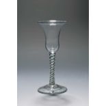 A colour twist wine glass, c.1770, the bell bowl raised on a stem enclosing a narrow white thread