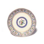 A Serves circular dish (compotier rond), date code for 1792, painted with a central posy of