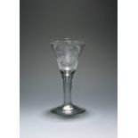 A Williamite wine glass, c.1760, the generous drawn trumpet bowl engraved with the king on horseback