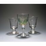 Two glass rummers, c.1800, with generous flared bucket bowls raised on short plain stems, and a