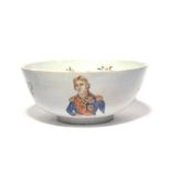 A delftware punch bowl, 19th century, the exterior with a portrait of Admiral Nelson, a ship and
