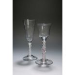 A wine glass and an ale glass, c.1760, the wine with an ogee bowl with everted rim, raised on an