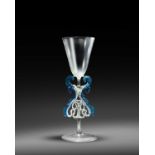 A rare façon de Venise winged serpent-stemmed glass or goblet, 17th century, the tall rounded funnel