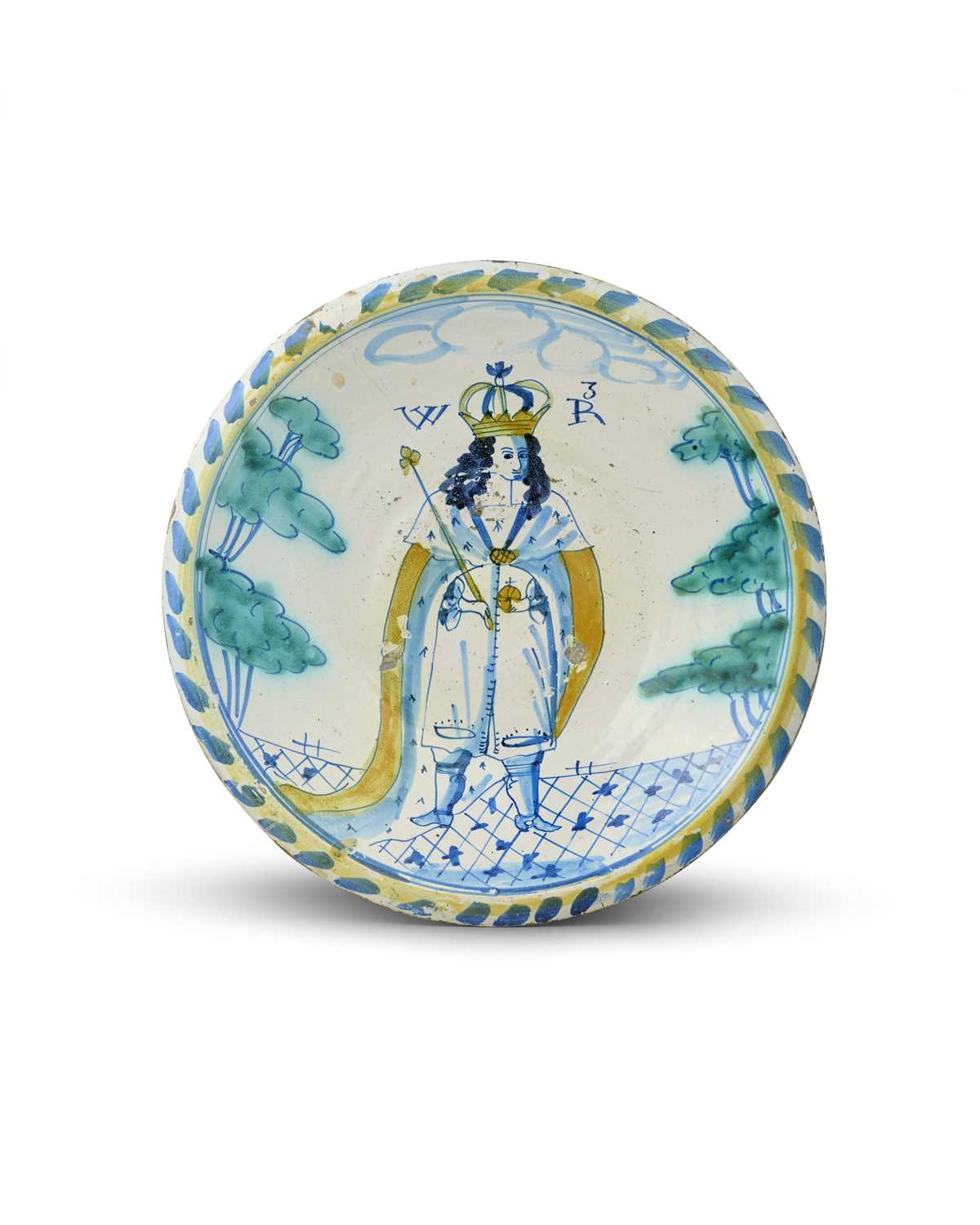 A London delftware Royal blue dash charger, c.1690-95, painted with a full length standing