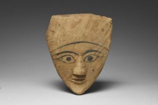 An Egyptian sarcophagus mask Late Period, circa 664 - 332 BC with painted eyes, brows and forehead