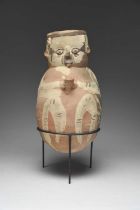 A Chancay figural vessel Peru, circa 1100 - 1400 AD pottery, modelled with a face to the neck and