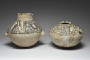 A Mesa Verde kiva jar Southwest North America pottery, of compressed ovoid form having a lip