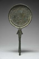 An Etruscan bronze hand mirror circa 3rd - 2nd century BC engraved the Dioskouroi, Castor and