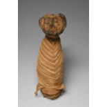 An Egyptian mummified cat Late Period - Ptolemaic Period, circa 664 - 30 BC the body with tightly