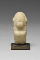 A Taino figural amulet Dominican Republic, circa 1000 - 1500 AD stone, carved with rectangular