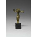 An Etruscan bronze figure circa 2nd century BC of a nude male dancer, with large ears and a