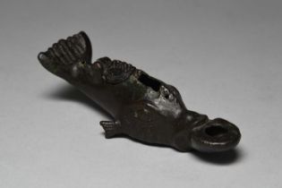 A Roman bronze dolphin lamp circa 3rd century AD with a hinged cover and pierced for hanging, 16cm