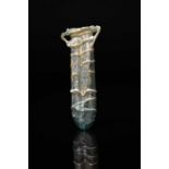 A Roman pale green glass double unguentarium circa 3rd - 4th century AD with two conjoined tubular