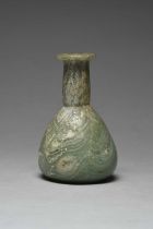 A Roman marbled glass toilet bottle circa 1st century AD green with white striations and of pear