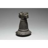 A Taino pestle Greater Antilles, circa 1000 - 1500 AD stone, with a carved crouching zemi figure