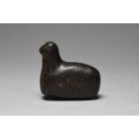 A Middle Eastern hardstone reclining animal possibly 1st / 2nd millenium BC in a green/black