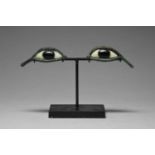 A pair of Egyptian style bronze eyes with white stone sclera and black composite irises, 7.1cm long,