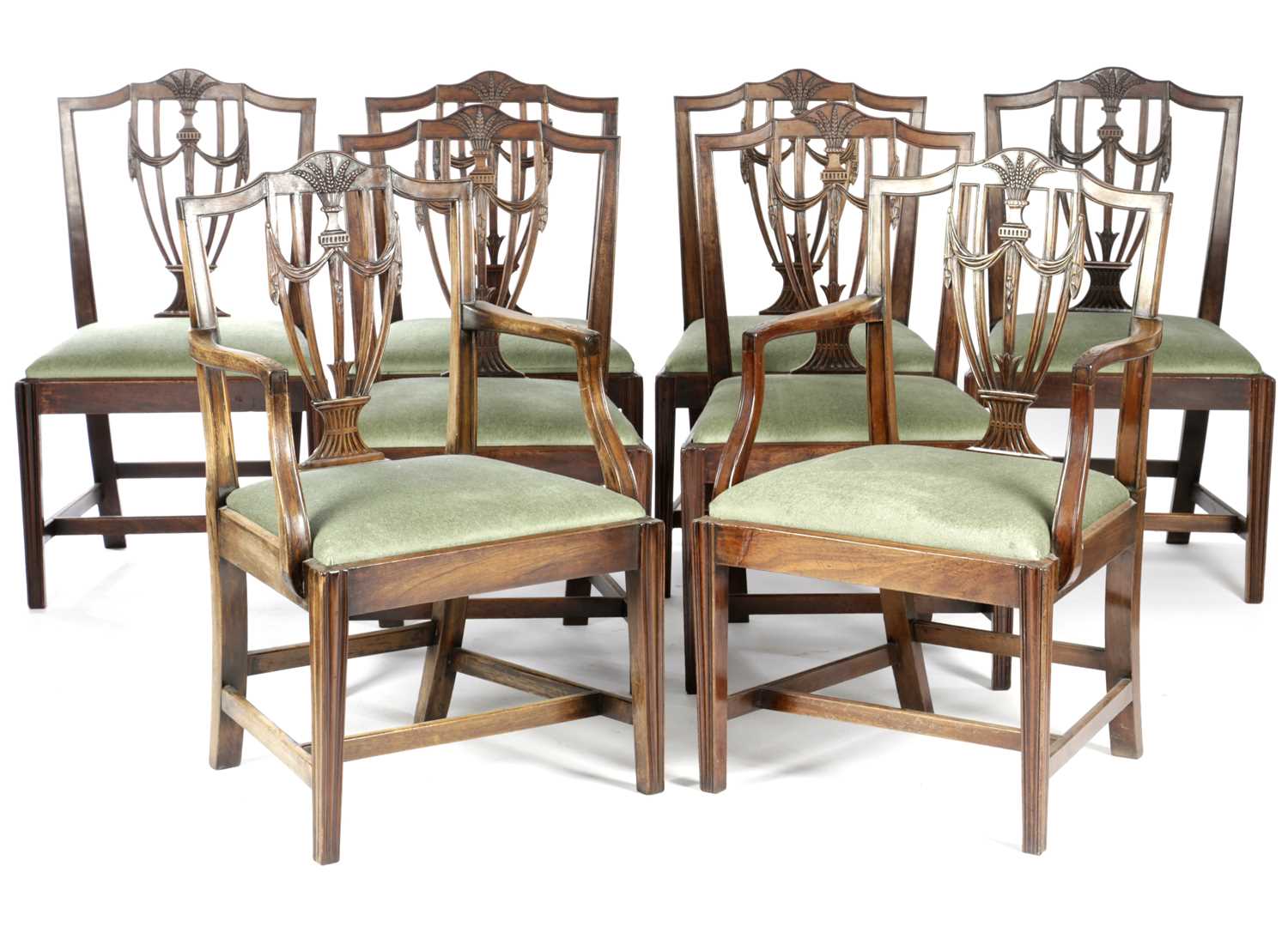 A SET OF EIGHT GEORGE III MAHOGANY DINING CHAIRS IN HEPPLEWHITE STYLE, LATE 18TH CENTURY each with a