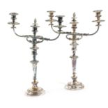 A PAIR OF SILVER PLATED THREE LIGHT CANDELABRA IN GEORGE III STYLE, LATE 19TH / EARLY 20TH CENTURY