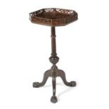 A MAHOGANY TRIPOD WINE TABLE IN GEORGE II STYLE, 19TH CENTURY the octagonal top with a pierced