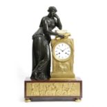 A FRENCH EMPIRE GILT AND PATINATED BRONZE MANTEL CLOCK POSSIBLY BY DEVILLAINE, EARLY 19TH CENTURY