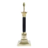 A GILT BRASS CORINTHIAN COLUMN TABLE LAMP LATE 19TH / EARLY 20TH CENTURY with an ebonised fluted