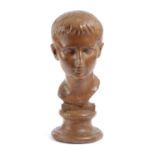 AN ITALIAN TERRACOTTA GRAND TOUR BUST OF CAESAR AUGUSTUS AFTER THE ANTIQUE, LATE 19TH CENTURY or