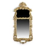 AN EARLY GEORGE III GILTWOOD MIRROR IN THE MANNER OF JOHN LINNELL, C.1760 the two plates in a