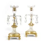 A PAIR OF GEORGE III GILT BRONZE AND WHITE OPAQUE GLASS CANDLESTICKS ATTRIBUTED TO WILLIAM PARKER,