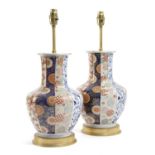 A PAIR OF JAPANESE IMARI PORCELAIN VASE TABLE LAMPS 20TH CENTURY each of baluster shape decorated