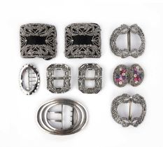 A collection of cut steel shoe buckles, 19th century, comprising: four pairs of buckles and one