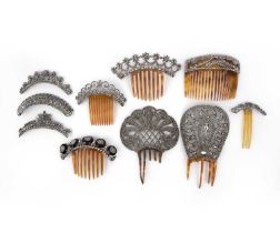 λ A collection of cut steel hair ornaments, 19th century, comprising: ten hair ornaments;