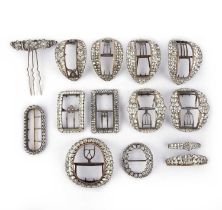 A collection of paste shoe buckles, brooches and a hair ornament, late 18th/early 19th century,