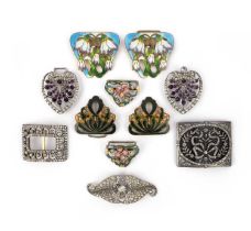 A collection of enamel and paste buckles, late 19th/early 20th century, comprising: three Art