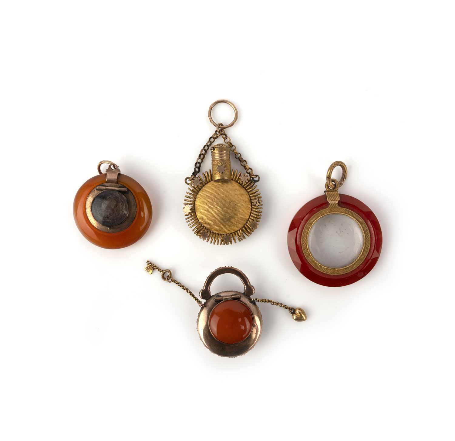 A group of eight Georgian carnelian pendants, early 19th century, comprising: two pendants - Image 6 of 7