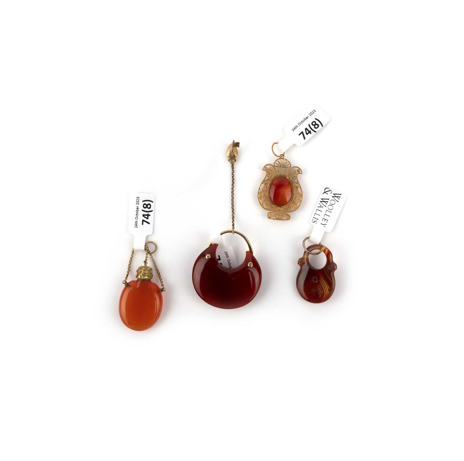 A group of eight Georgian carnelian pendants, early 19th century, comprising: two pendants - Image 7 of 7